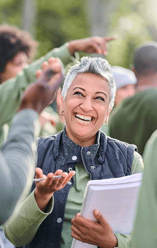 Women smiling with clipboard